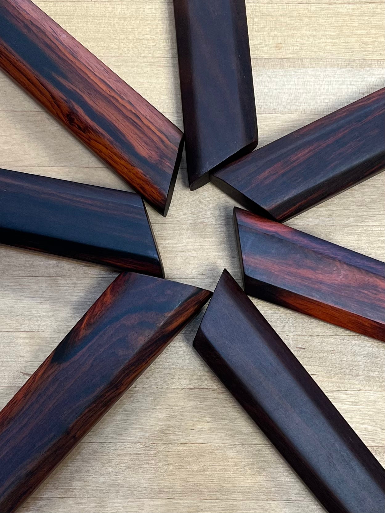 close-up of Dao Vua rosewood knife handles