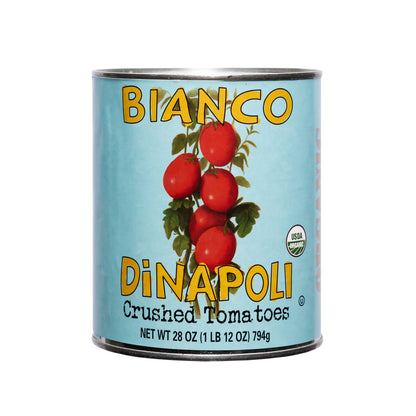 A can of Bianco DiNapoli organic crushed tomatoes with a blue label, displaying the brand name and a picture of tomatoes.