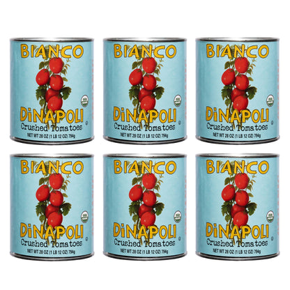 Six cans of Bianco Di Napoli crushed tomatoes on a white background.