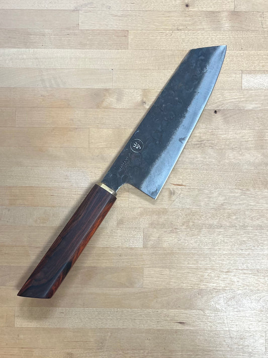 Dao Vua  knife on a cutting board