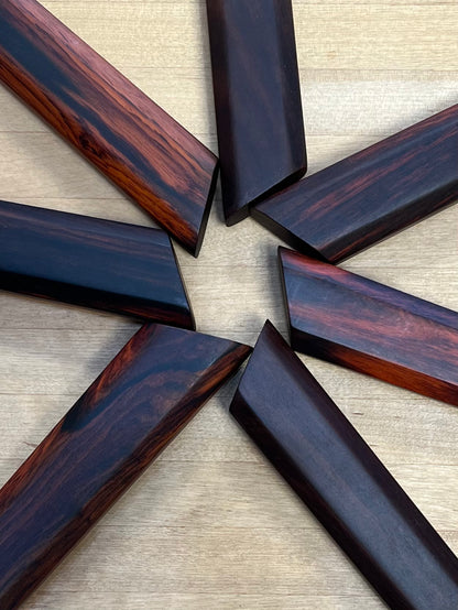 close-up of Dao Vua rosewood knife handles