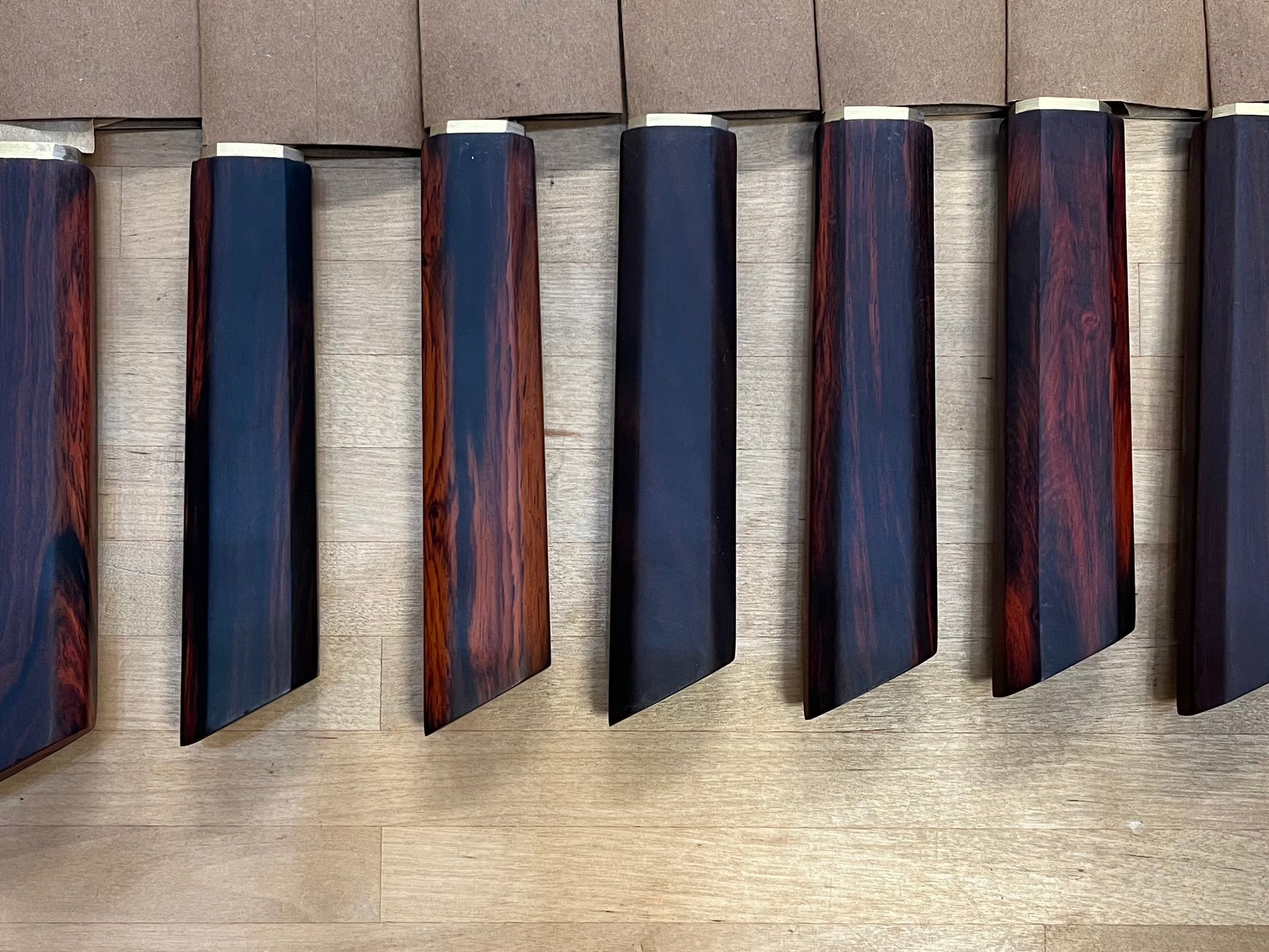 close-up of Dao Vua rosewood knife handles