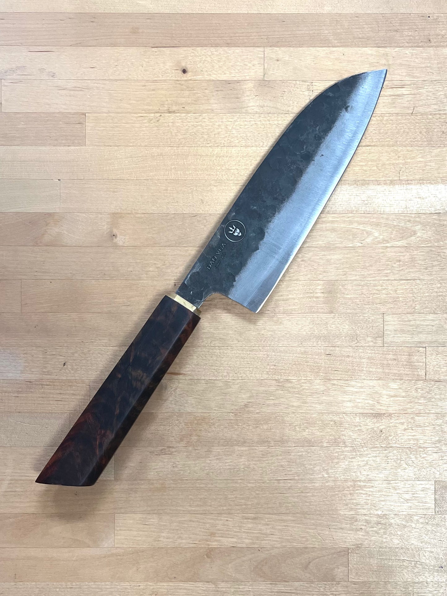 Doa Vua knife on a cutting board