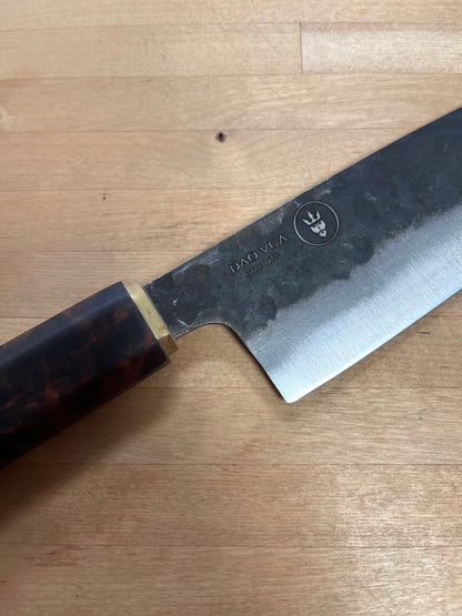 Close up of a Dao Vua knife with a maker's mark brand