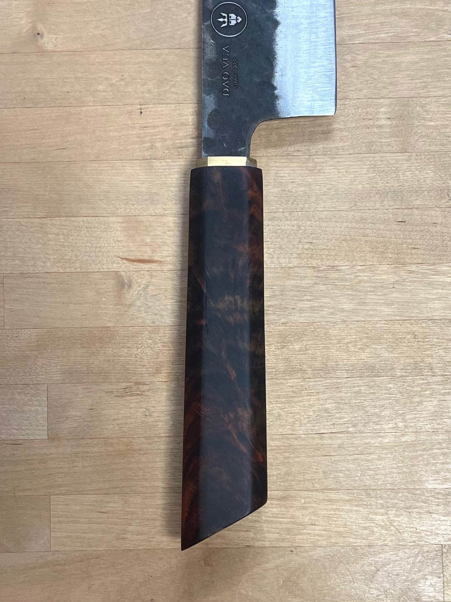 close-up of a Dao Vua rosewood knife handle