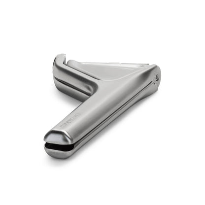 A stainless steel Fluicer, shown on a clean white background.