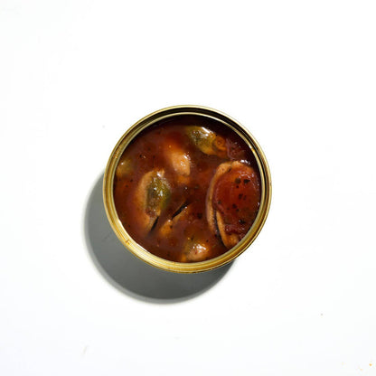 Canned food with a gold lid on a white background