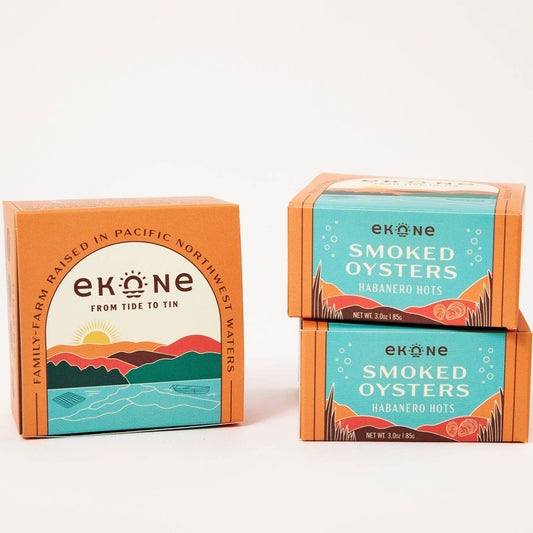 Two boxes of ek-one smoked oysters on a white background