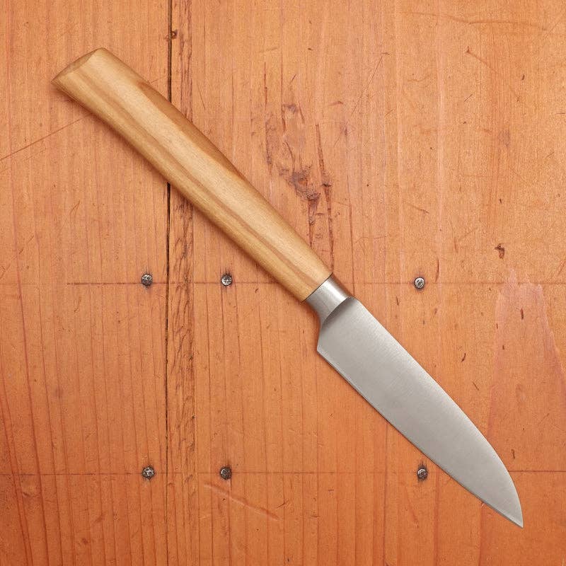 Knife with wooden handle on a wooden surface