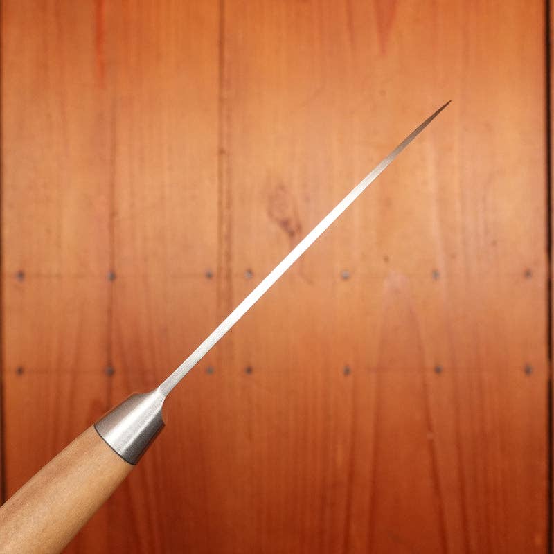 F. Herder knife with wooden handle on a wooden background