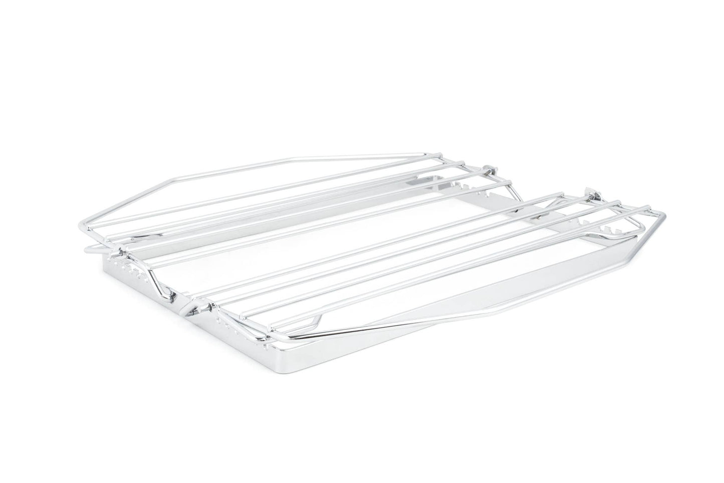 Chrome metal rack laying flat on a white background