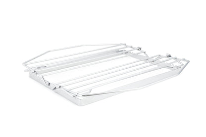 Chrome metal rack laying flat on a white background