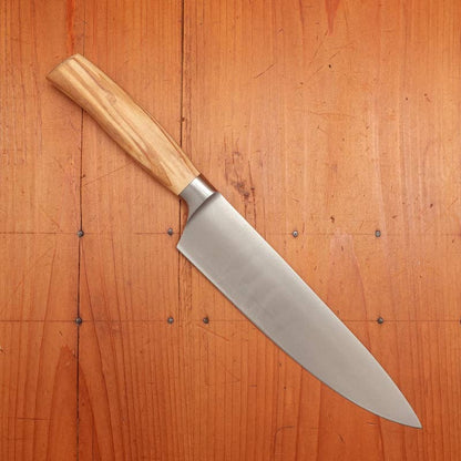 F. Herder stainless steel chef knife with olive wood handle, made in Germany.