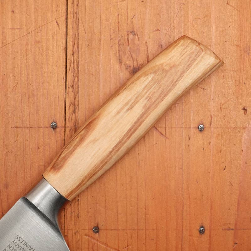 F. Herder stainless steel chef knife with olive wood handle, made in Germany.
