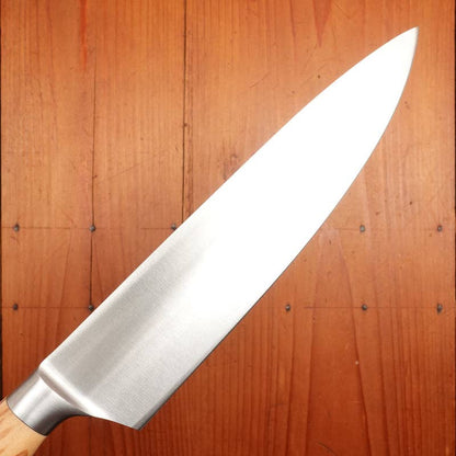 F. Herder stainless steel chef knife with olive wood handle, made in Germany.