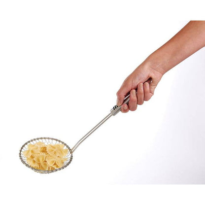 Metal strainer with pasta held by a hand on a white background