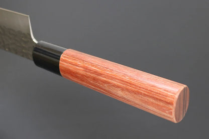 A close-up of a Japanese kitchen knife showing its wooden handle and textured steel blade against a dark gray background.