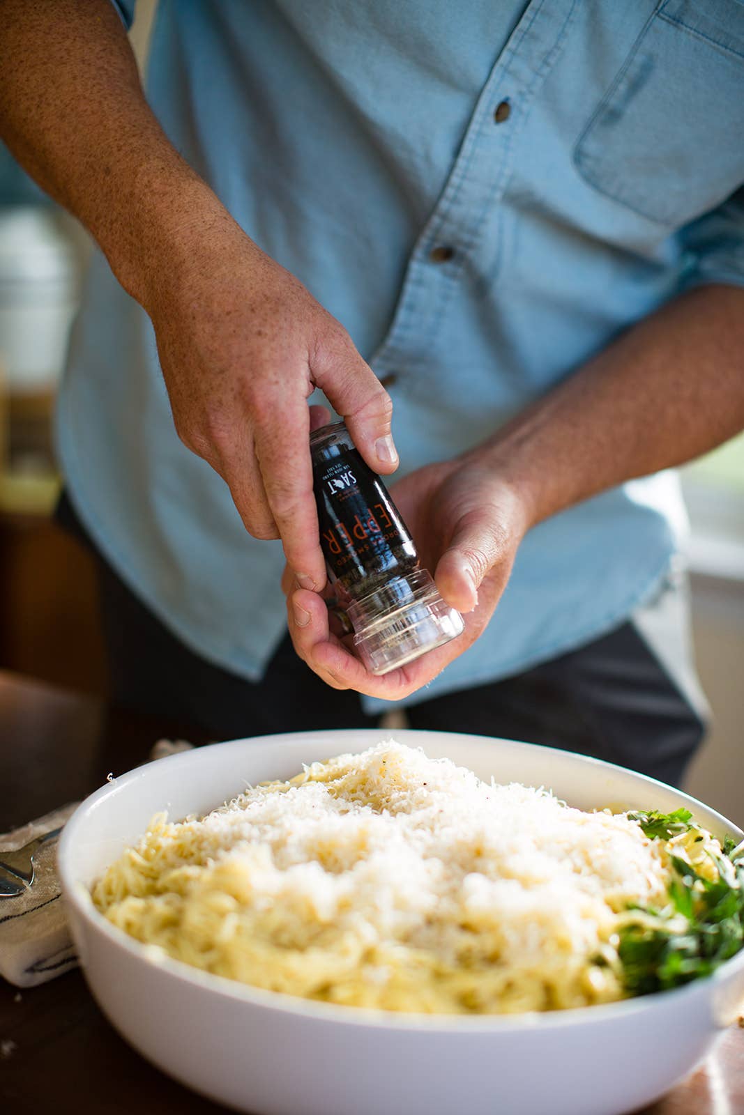 pepper grinding action shot