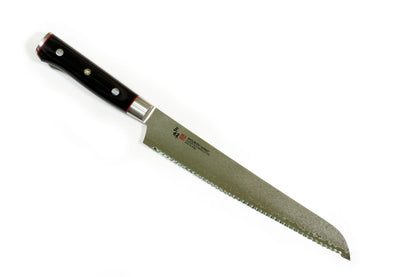 Serrated bread knife with a black handle on a white background