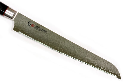 A Japanese bread knife with a Damascus steel blade and a black handle, shown diagonally on a plain white background.