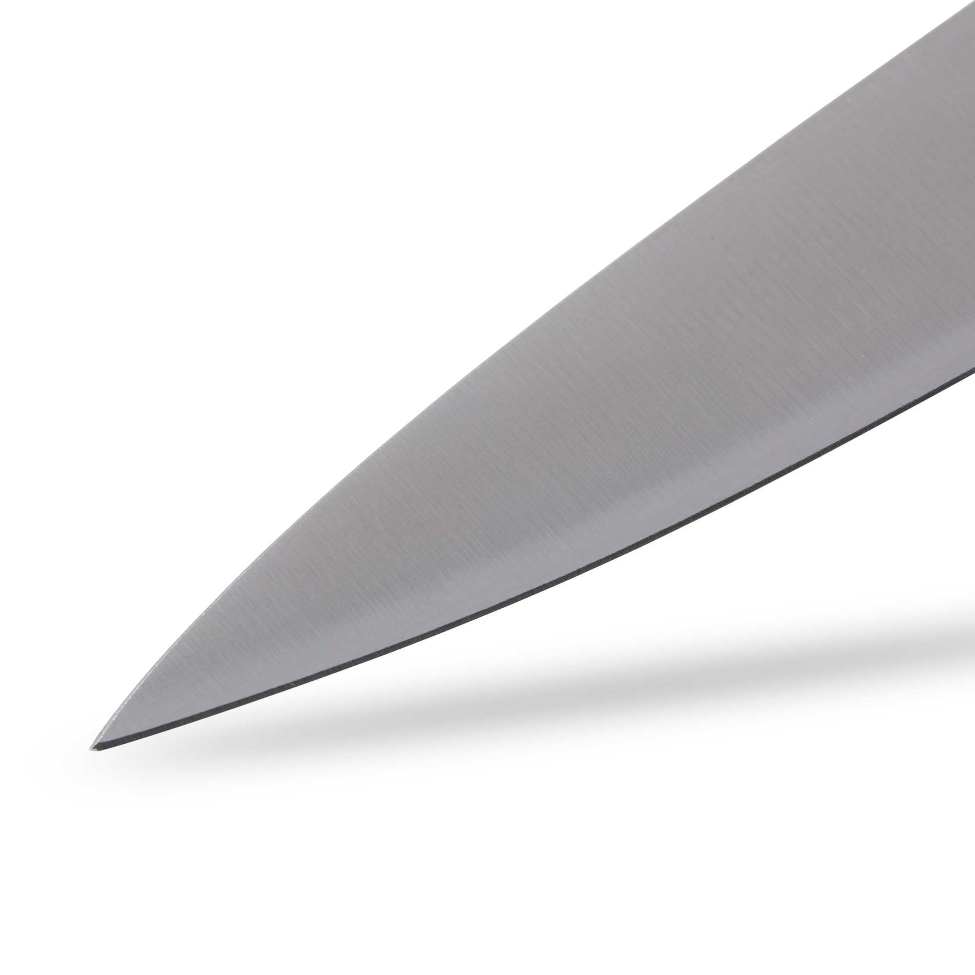 Close-up of a knife blade on a white background