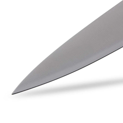 Close-up of a knife blade on a white background