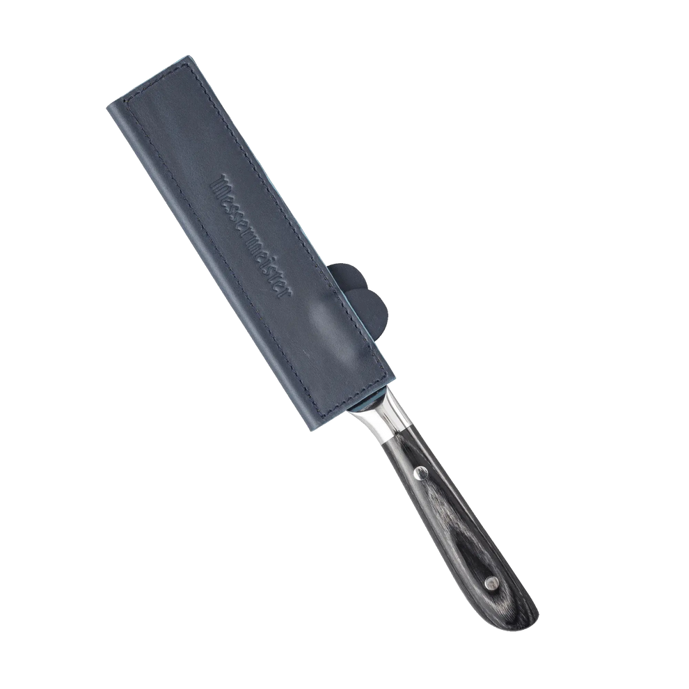 Knife with a blue leather sheath on a white background