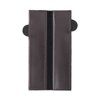 Inside view of leather knife guard with stitching detail on a white background