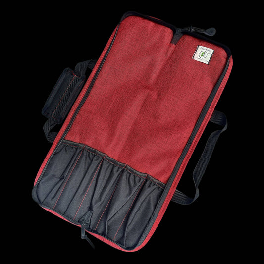 Red and black  Knife bag with a visible Messermeister logo on a black background