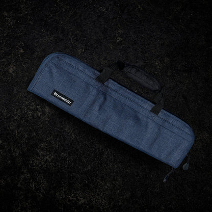 Blue knife bag with a Messermeister logo on a dark textured background