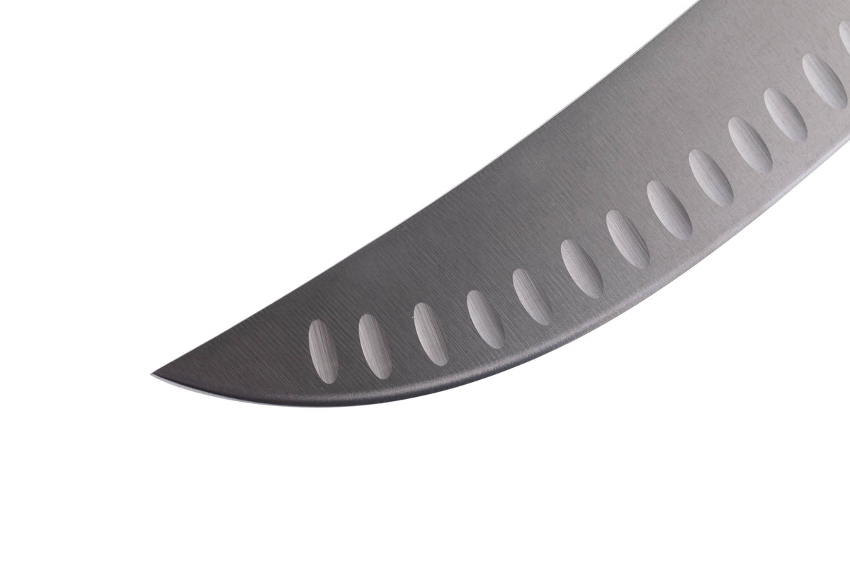 Close-up of a curved blade with a white background