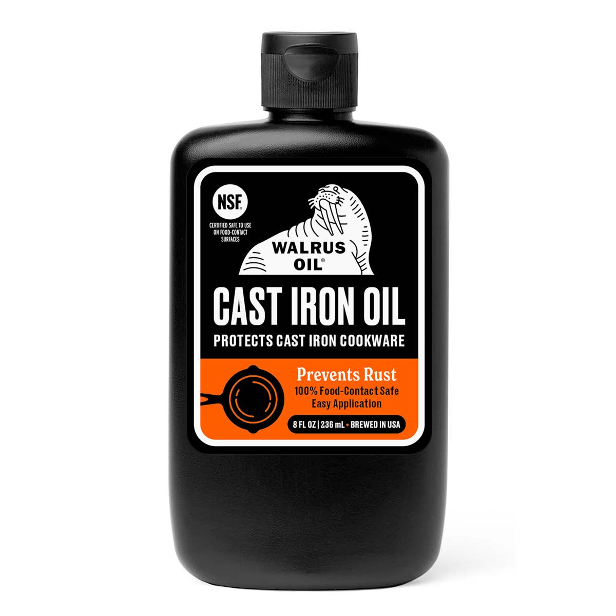 Black bottle of Walrus Oil Cast Iron Oil on a white background