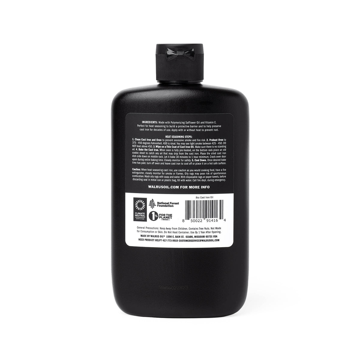Black bottle with label on a white background